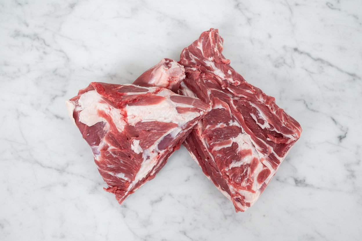 Two pieces of bone-in lamb shoulder meat