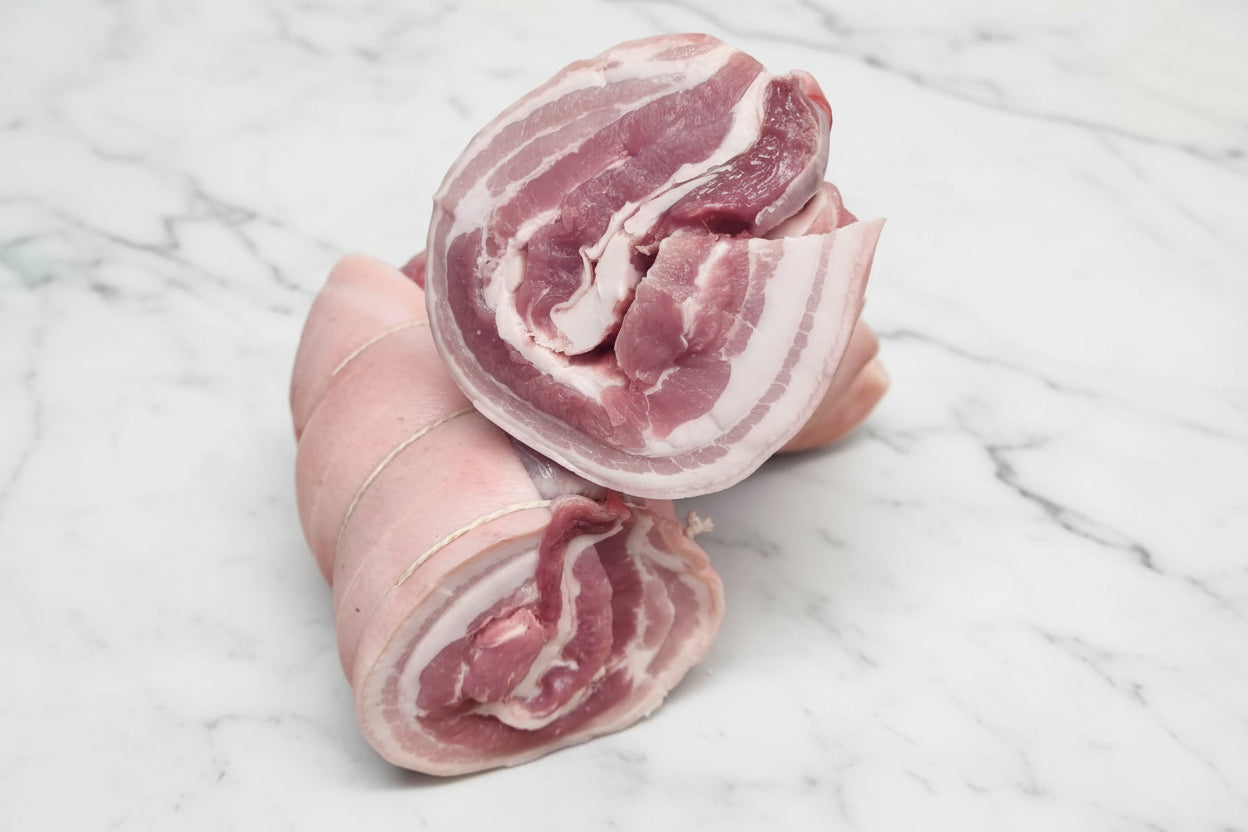 A boned and rolled joint of belly pork, consisting of several layers of fat and meat