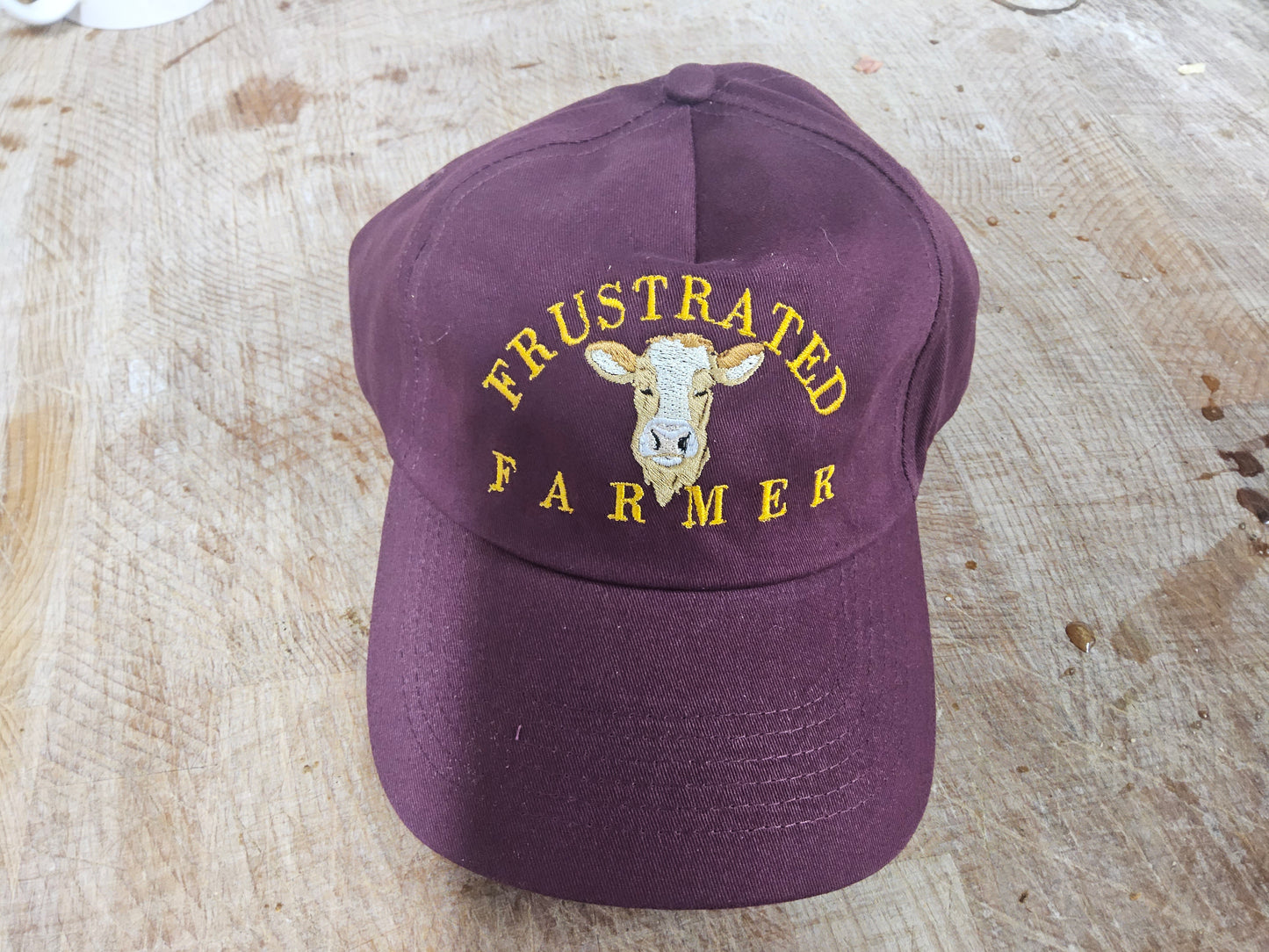 burgundy cap